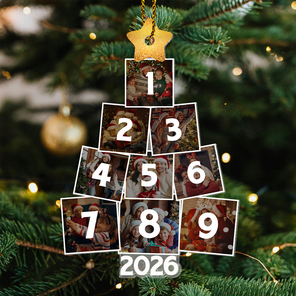 Family Christmas photo ornament hanging on Christmas tree