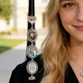 Personalized memorial graduation charm attached to graduation tassel