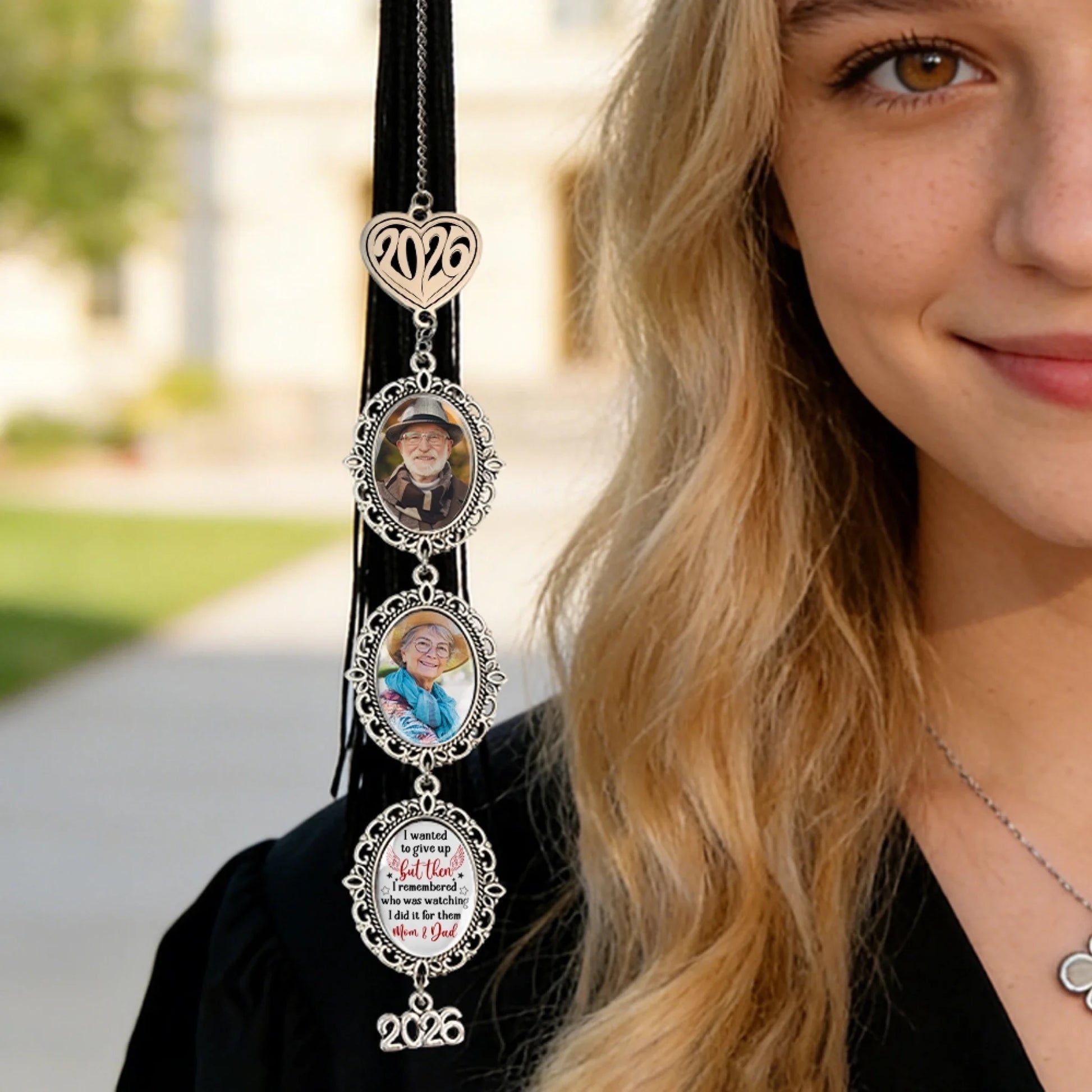 Personalized memorial graduation charm attached to graduation tassel