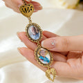 Custom graduation memorial charm featuring photo frame and remembrance design