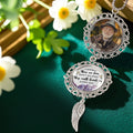 Custom memorial photo charm displayed in a remembrance floral setting