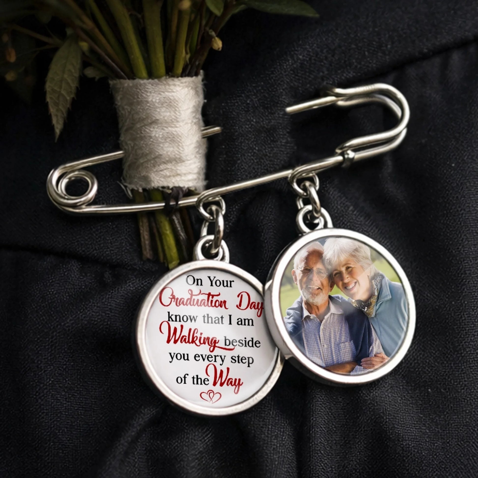 Personalized graduation lapel pin with memorial photo charms attached