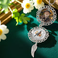 Custom remembrance photo ornament displayed in floral setting