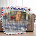 Custom memorial blanket displayed on bed