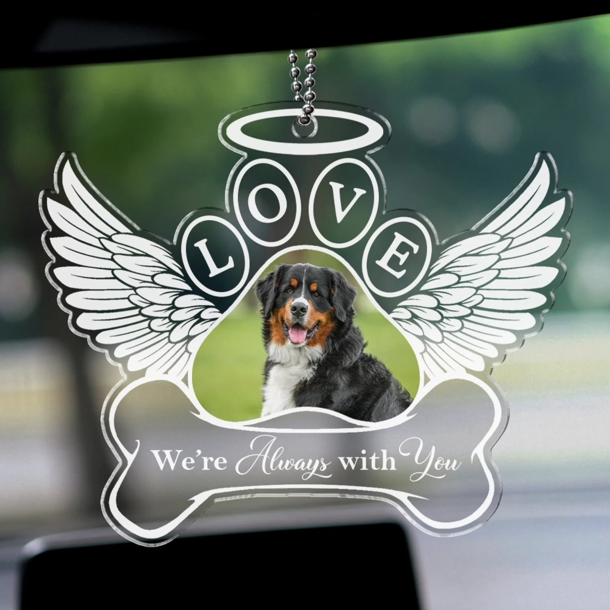 Personalized pet memorial ornament hanging from vehicle rear view mirror