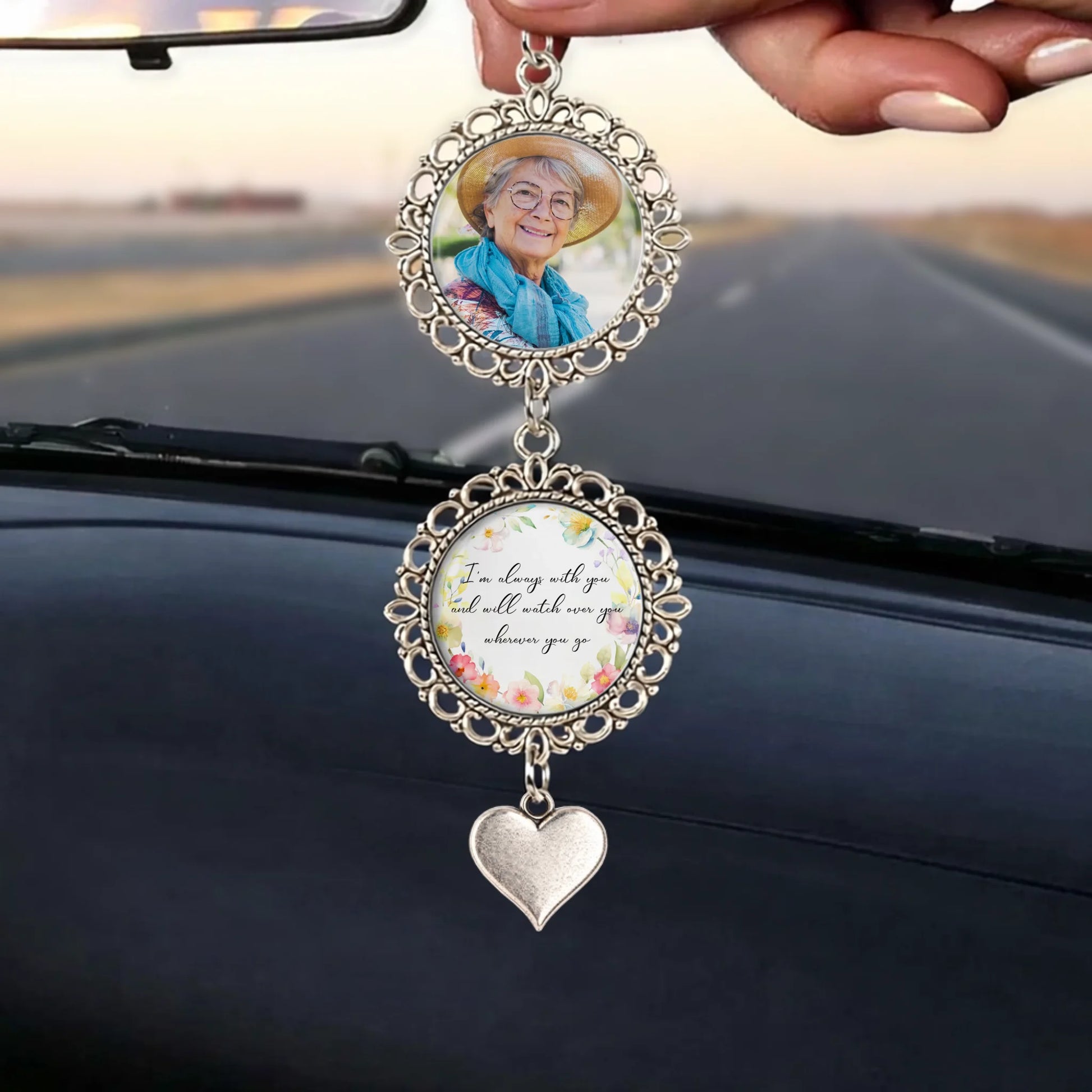 Custom remembrance car charm with angel wing pendant displayed in vehicle