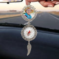 Custom photo remembrance charm hanging from rearview mirror