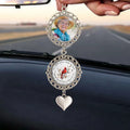 Personalized memorial ornament hanging inside vehicle