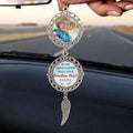 Personalized remembrance ornament hanging from vehicle rearview mirror