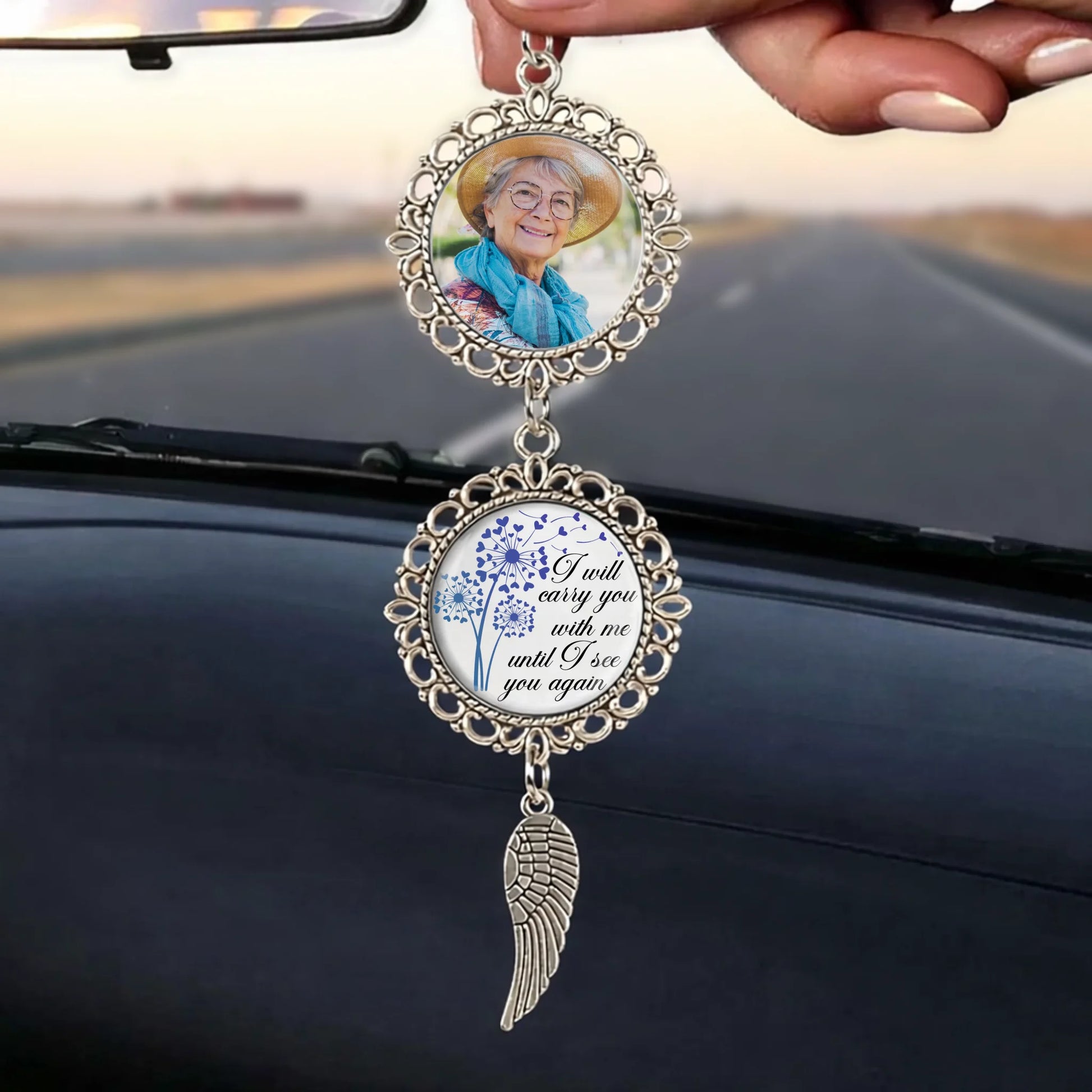 Personalized remembrance ornament hanging from a rearview mirror