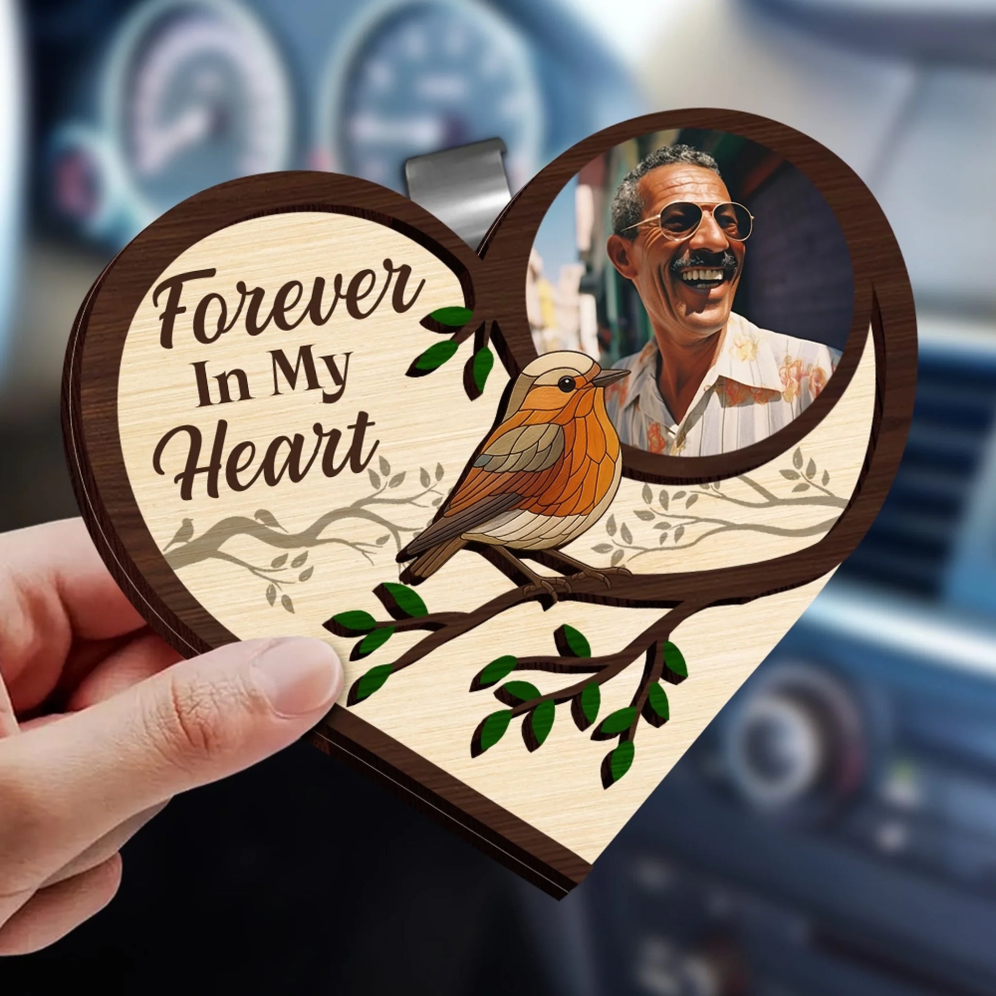 Memorial car visor clip with photo attached inside vehicle visor