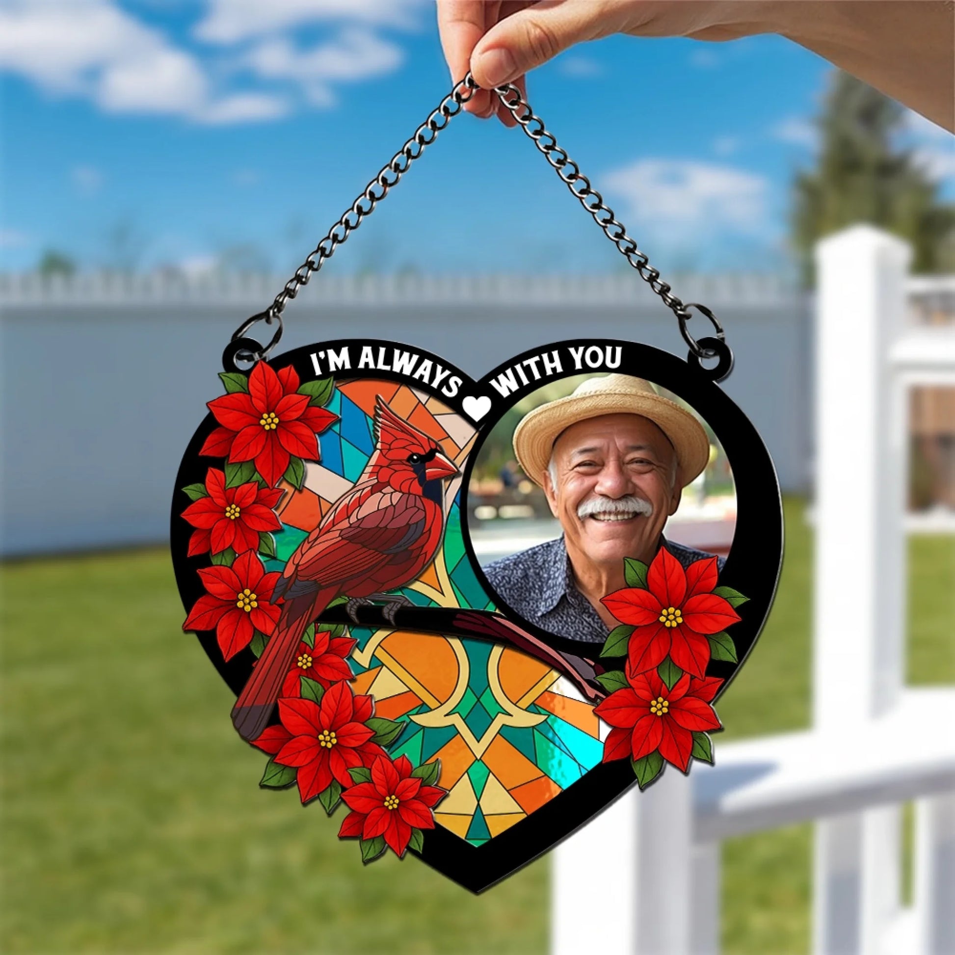 Memorial cardinal suncatcher displayed in window with custom photo