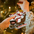 Custom snowman family Christmas ornament hanging on tree