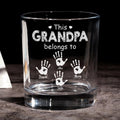 Custom whiskey glass with family names and handprints