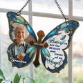 Personalized butterfly cross remembrance suncatcher displayed in window