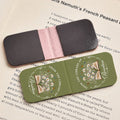 From The Library Magnetic Bookmark Clipped to Book Page