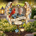 Personalized memorial garden stake with photo, cardinal and angel wings in a flower bed