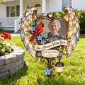 Memorial garden stake with grandma photo and quote standing on a front lawn