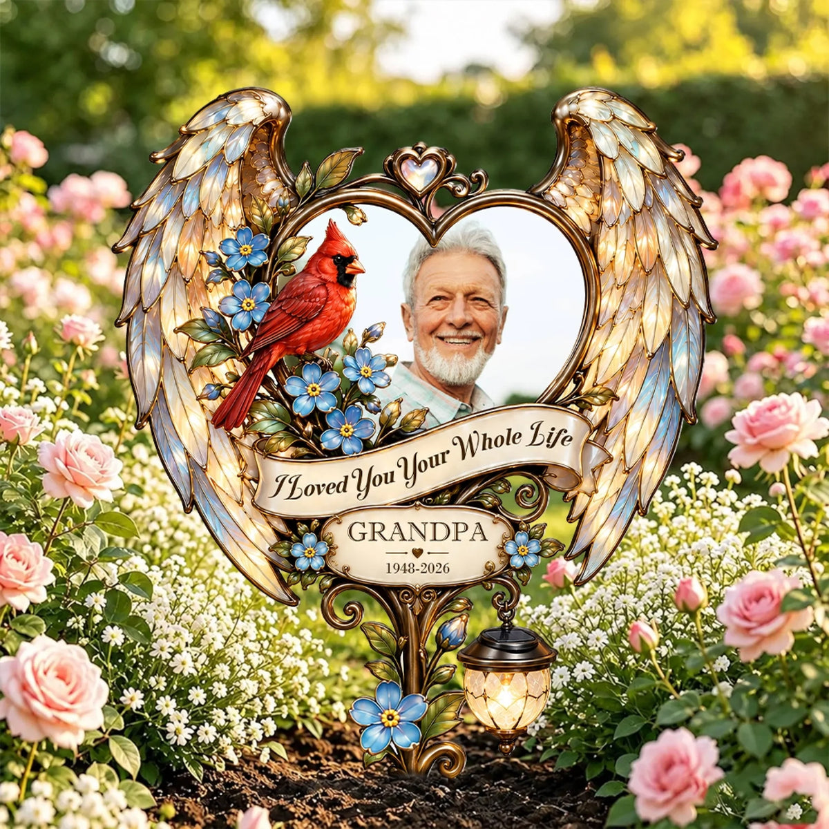 Cardinal angel wings memorial garden stake with grandpa photo among pink roses