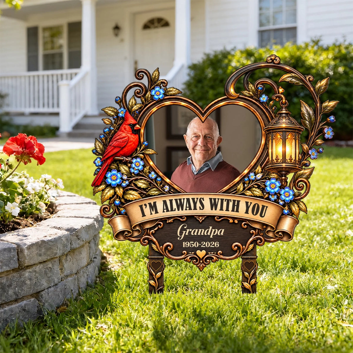 Cardinal heart memorial garden stake with grandpa photo on a front lawn