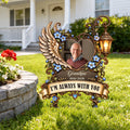Angel wing lantern memorial garden stake with grandpa photo on a front lawn