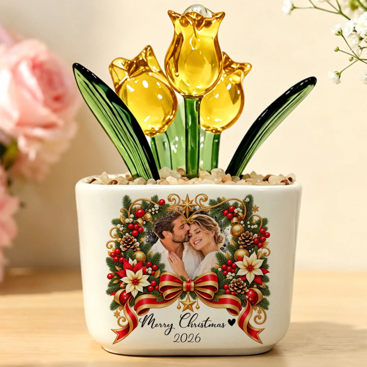 Orange glass tulip variant in Christmas wreath photo pot with red bow