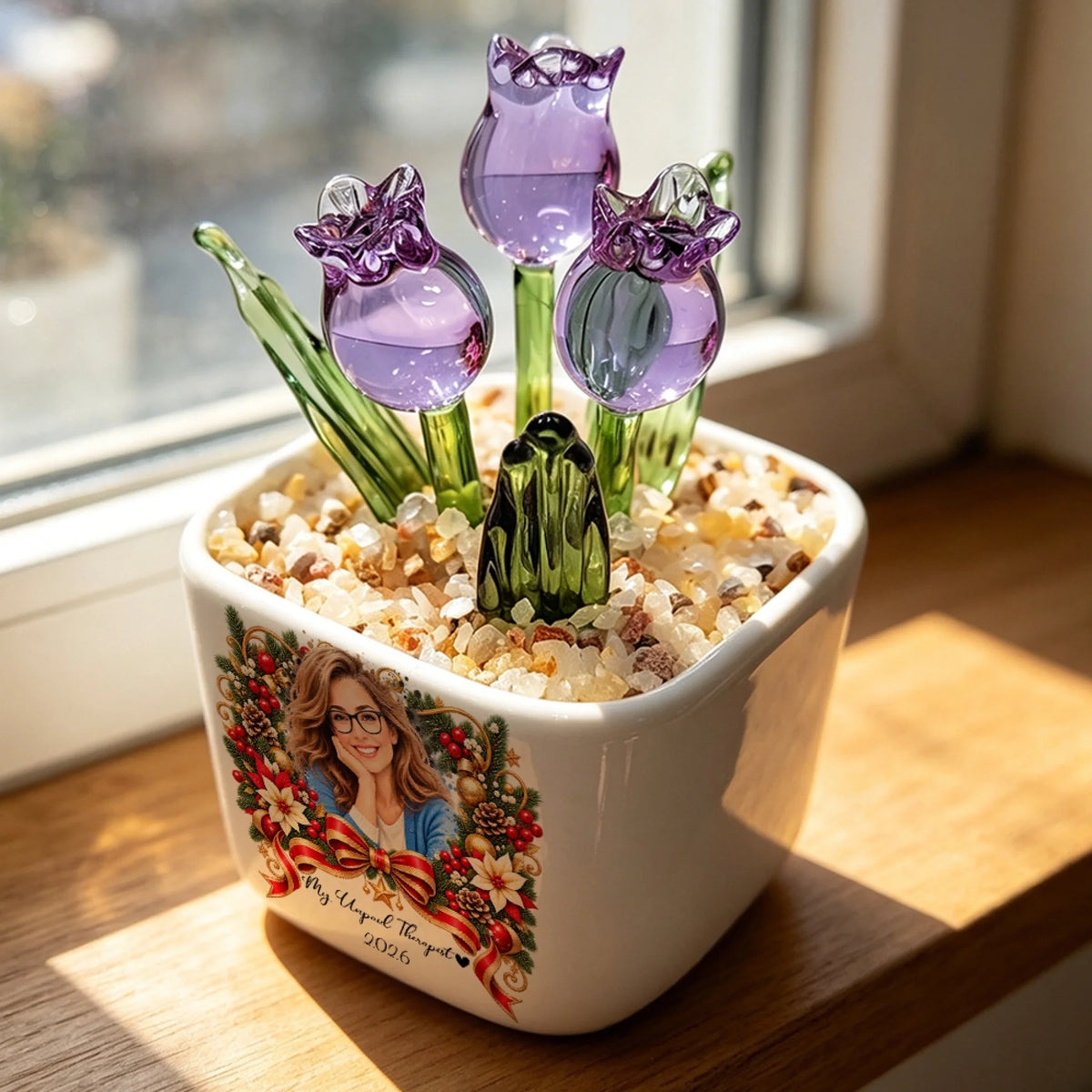 Purple glass tulip pot with custom photo on a sunny windowsill
