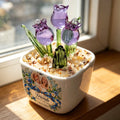 Purple glass tulip pot with Friends Until We Are Old design by a window