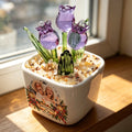 Purple glass tulip pot with friends photo and lantern design by a window