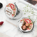 Silver personalized compact mirror with Forever Beautiful quote beside lipstick and flowers