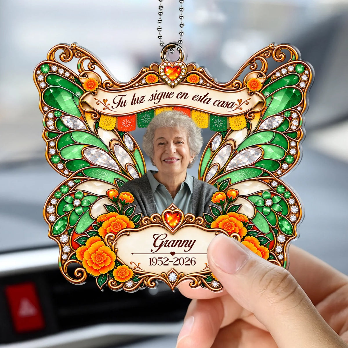 Green marigold butterfly memorial car hanger with photo, name and years in car