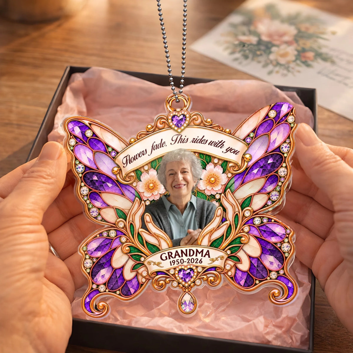 Purple butterfly memorial car hanger with Flowers Fade quote in a gift box