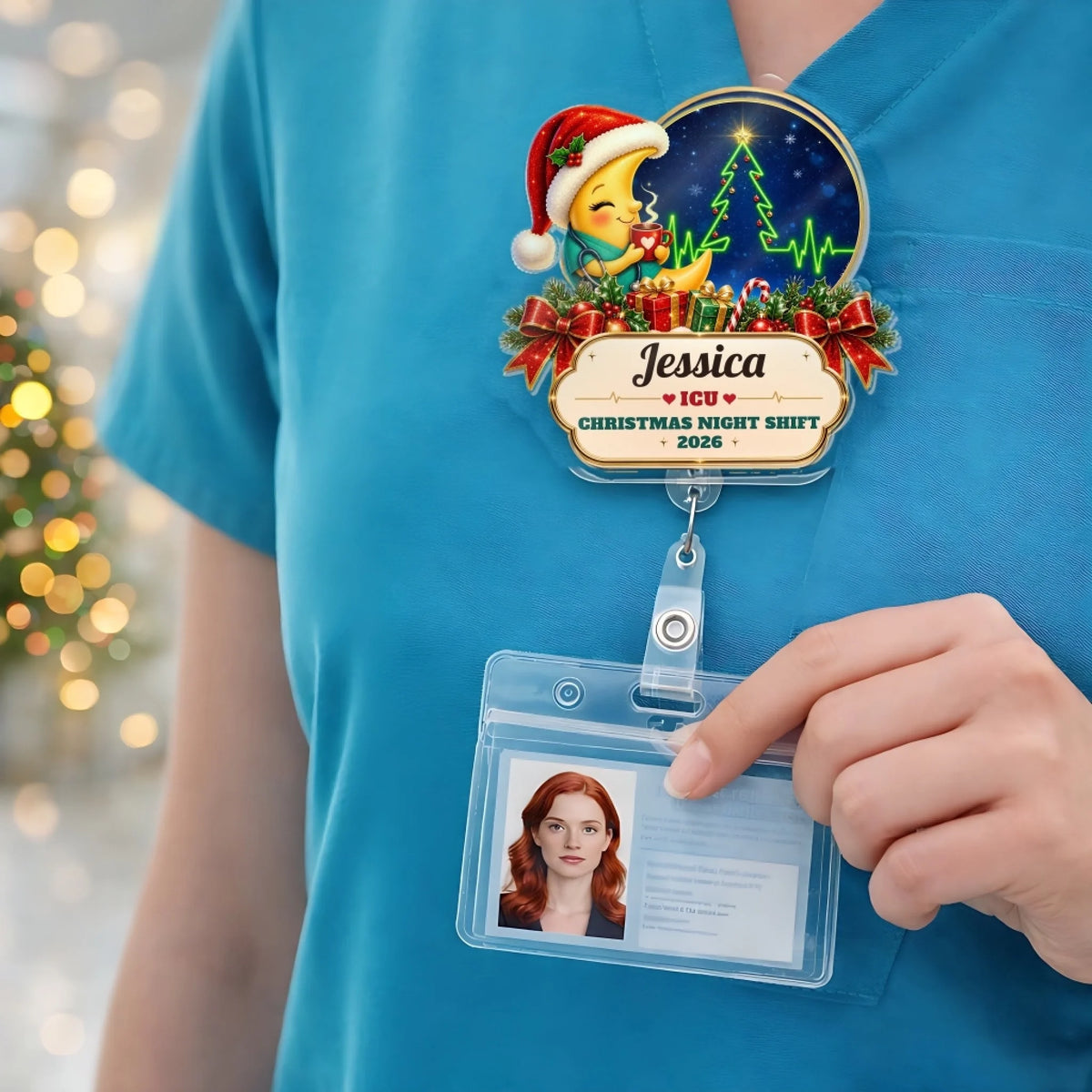 Christmas nurse badge reel clipped to blue scrubs with ID card
