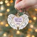 Back of memorial keychain with quote, name and years in a heart