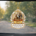 Gold collar pet memorial car hanger hanging from a rearview mirror