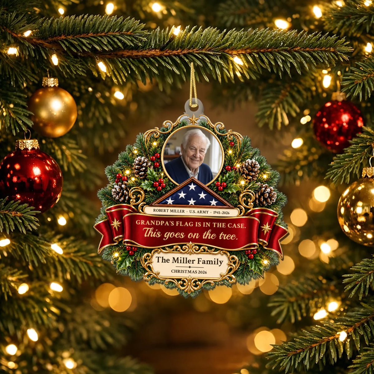 Veteran memorial Christmas ornament with photo, folded flag and quote ribbon on a tree