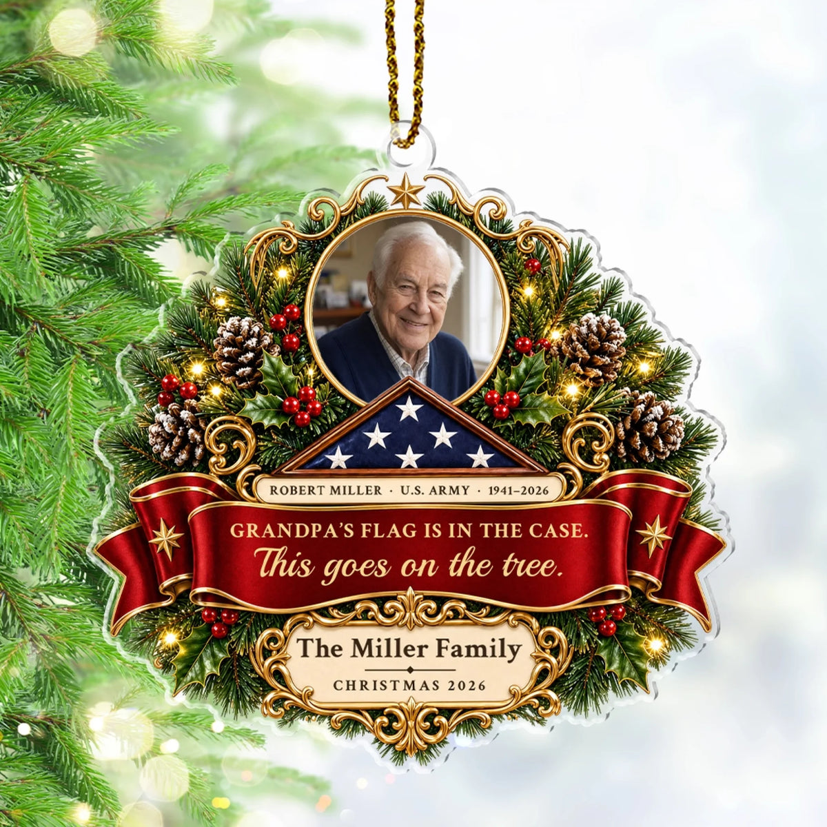 Veteran memorial ornament with photo, folded flag and red ribbon hanging on a Christmas tree
