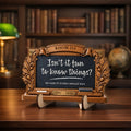 Teacher memorial wooden plaque on stand in a home library