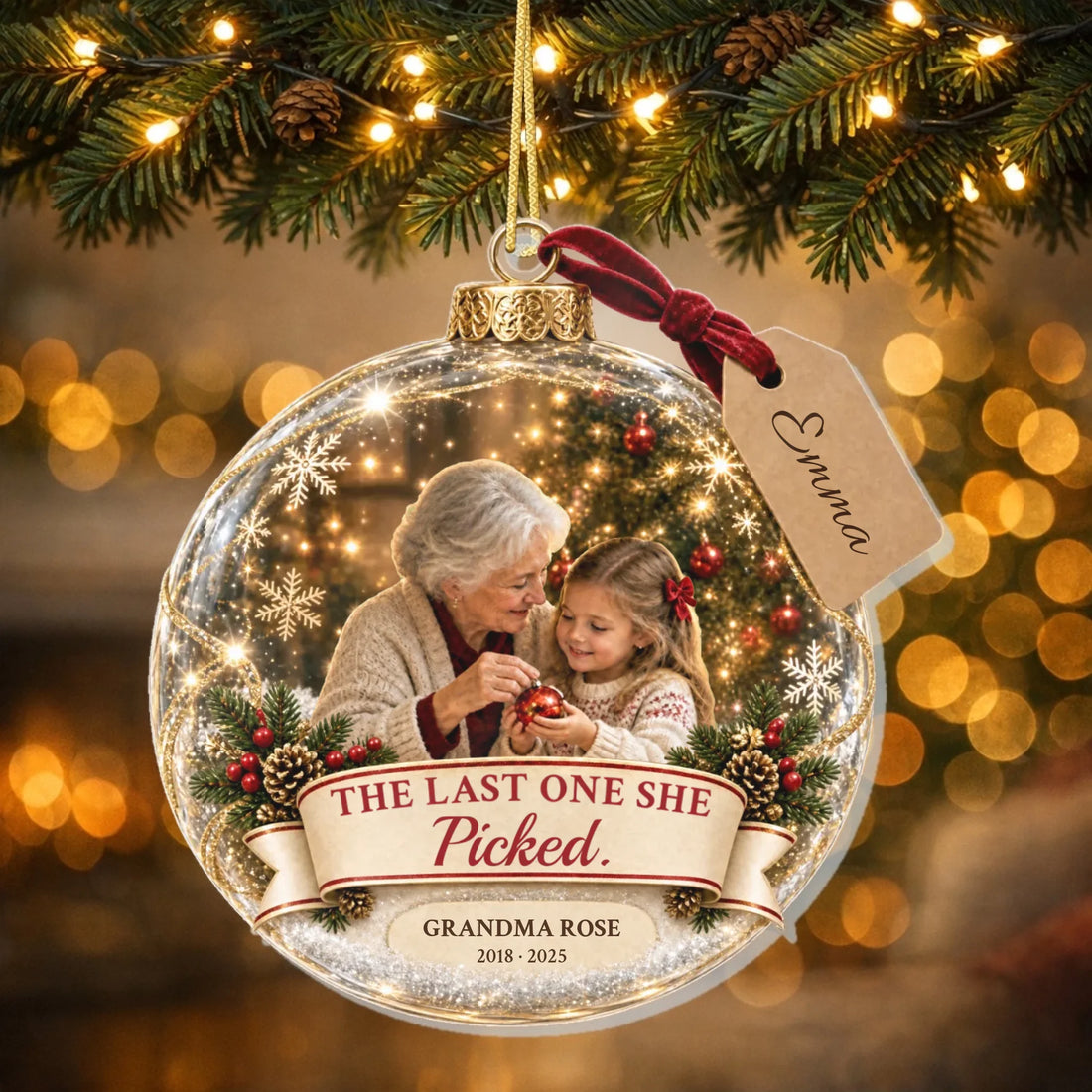 Personalized grandma memorial Christmas ornament with photo hanging on a lit tree