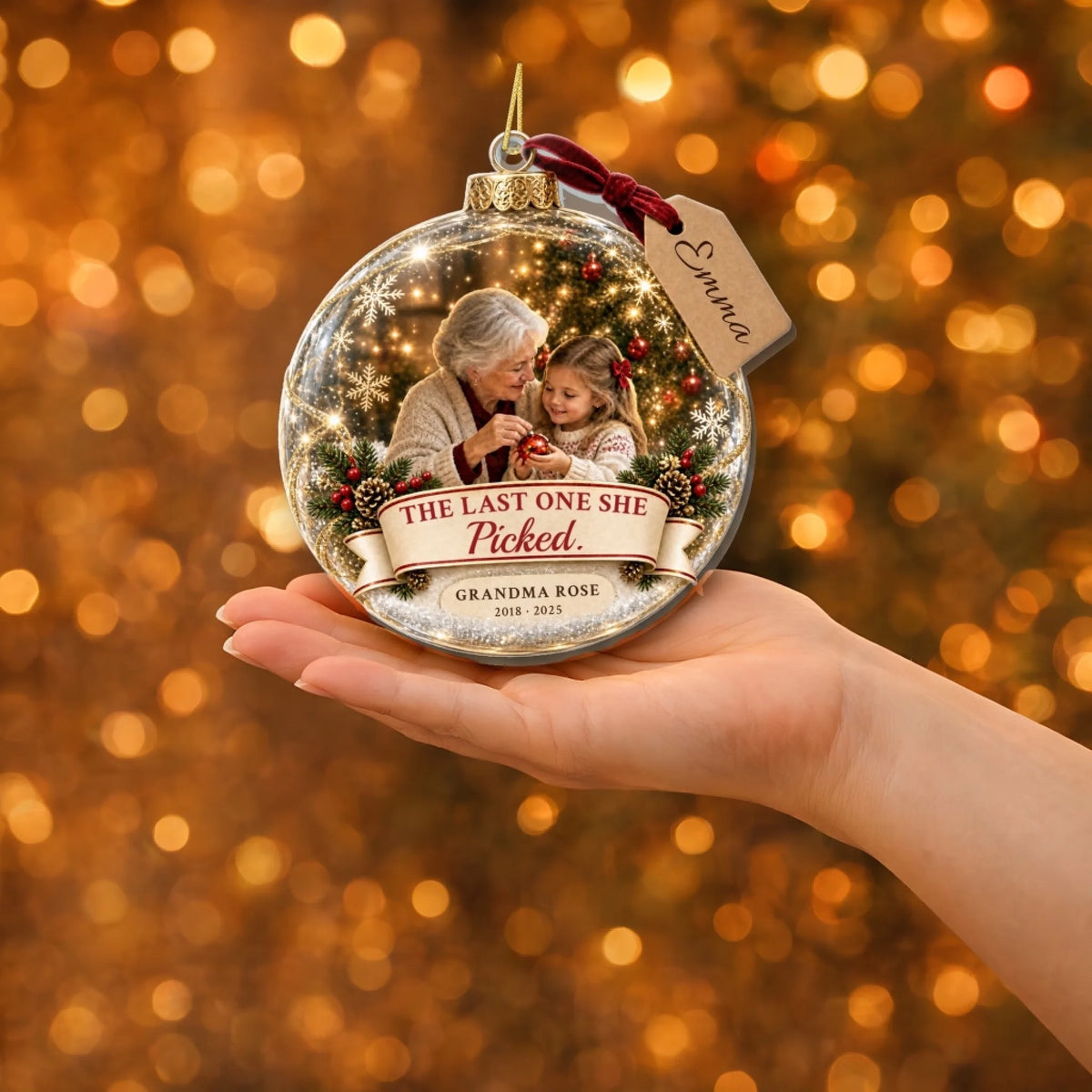 Grandma memorial Christmas ornament with photo resting in an open hand