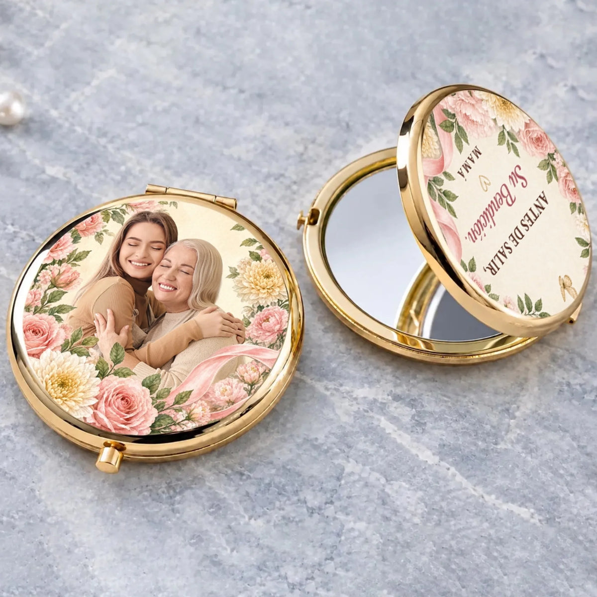Open gold Spanish blessing compact mirror showing the mirror inside