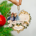 Hand holding wedding anniversary ornament with I Kept My Vows quote