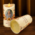 Thanksgiving memorial LED candle shown with its battery compartment underneath