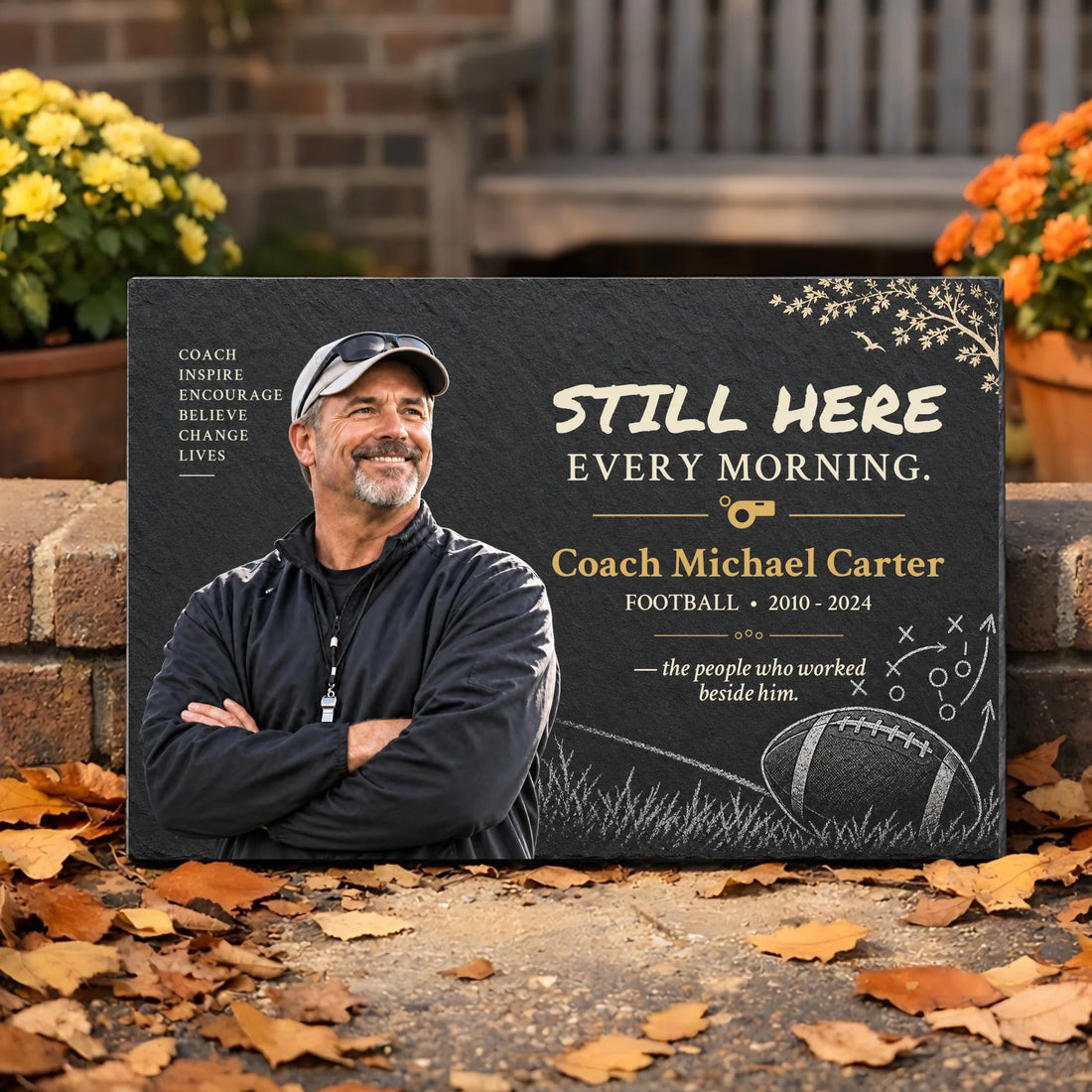 Personalized coach memorial garden stone with photo by autumn flowers and leaves